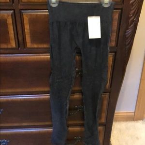NWT leggings. Nylon and spandex. One size